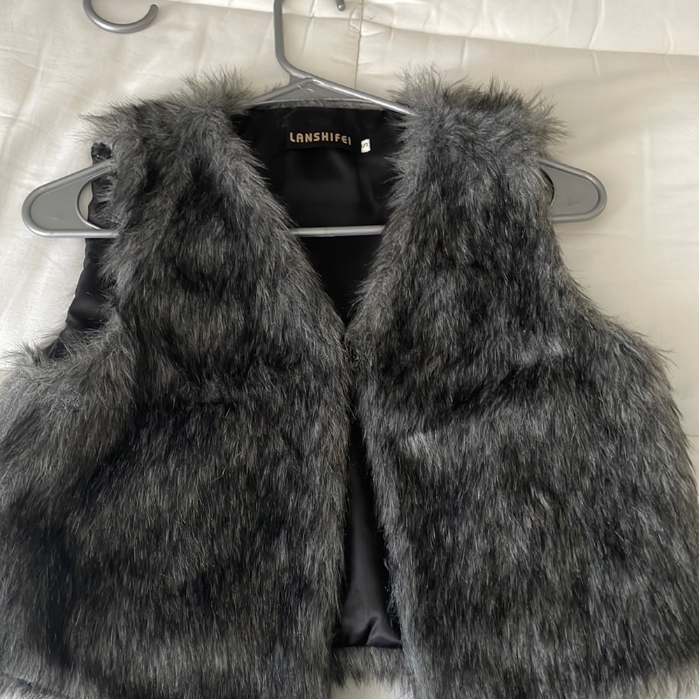 small fuzzy short vest
